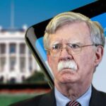 John Bolton charged over classified emails after Iranian hack of his AOL account